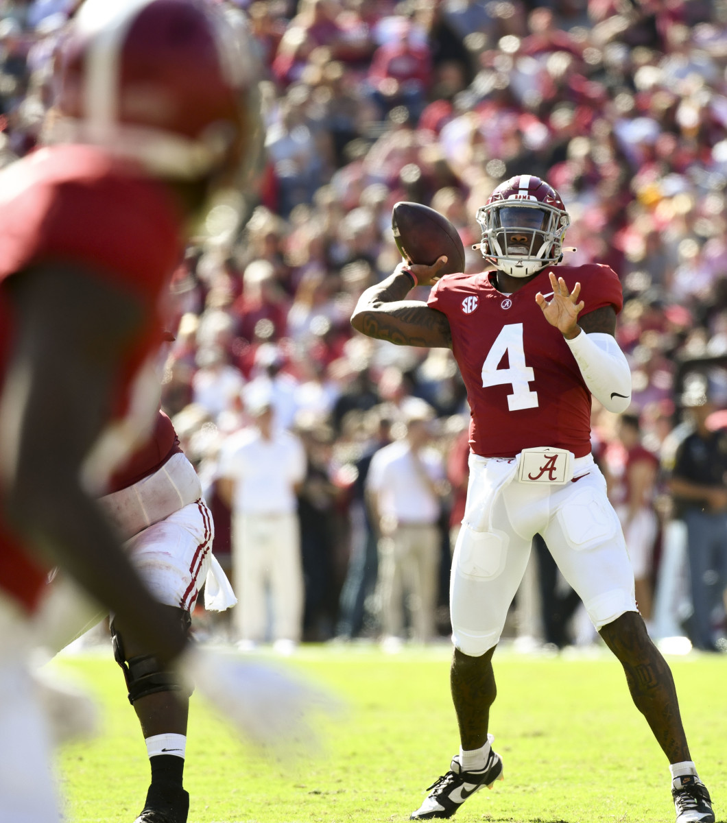 Nov 18, 2023; Tuscaloosa, Alabama, USA; Alabama Crimson Tide quarterback Jalen Milroe (4) throws against the Chattanooga Mocs at Bryant-Denny Stadium. Mandatory Credit: Gary Cosby Jr.-USA TODAY Sports